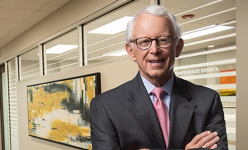 A headshot of Neal Lehman